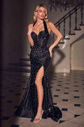 Black halter neck corset dress with pearl embellishments and a thigh-high slit.