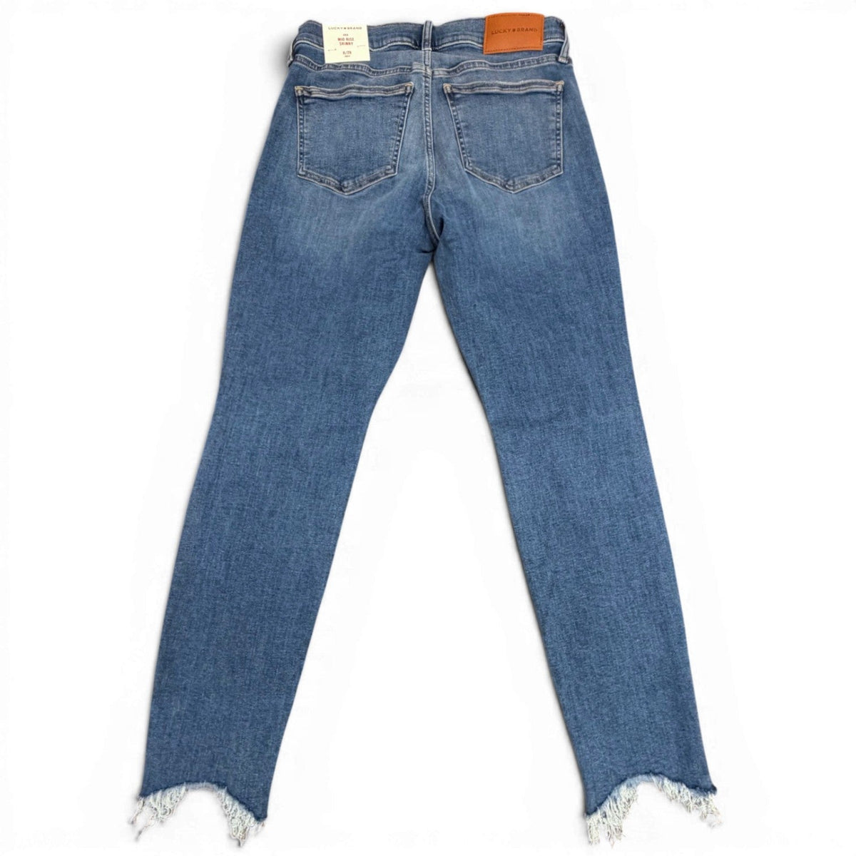 Lucky Brand Women's Mr Ava Skinny Jeans in Wild Light wash with distressed hem.