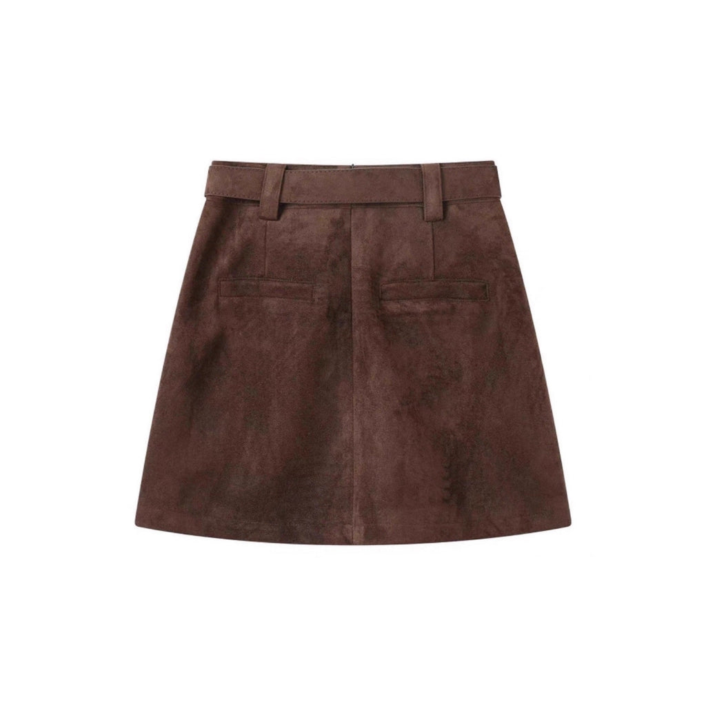 Back view of a brown suede A-line mini skirt with a high waist, belt loops, and two welt pockets.