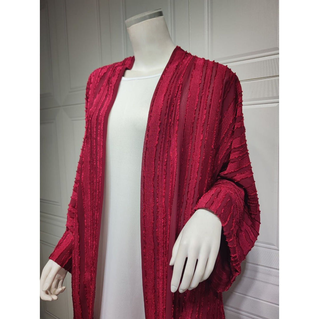 Red vintage knitted longline open front cardigan abaya with vertical stripes and fringe details.