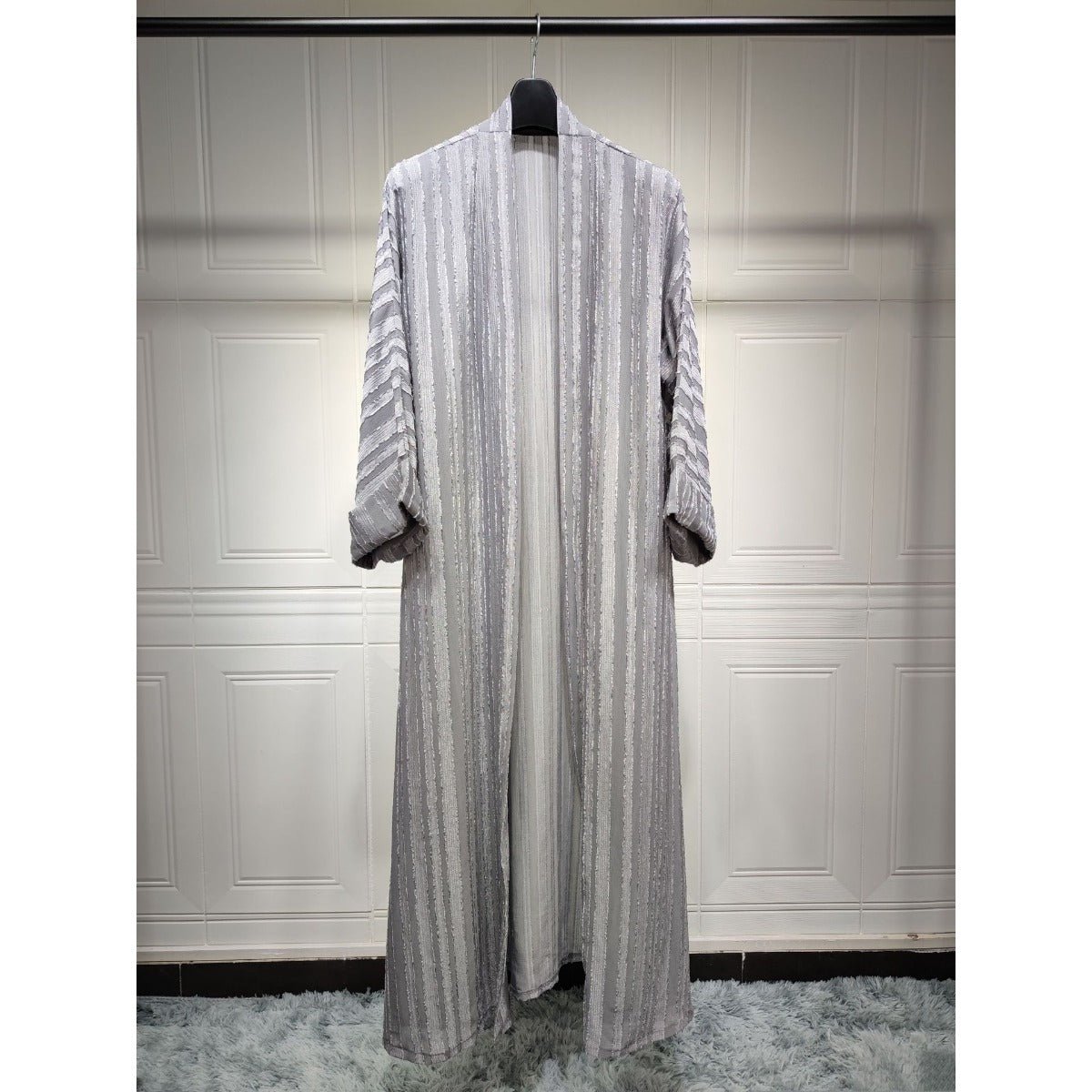 Grey vintage knitted longline open front cardigan abaya with vertical stripes and fringe details.