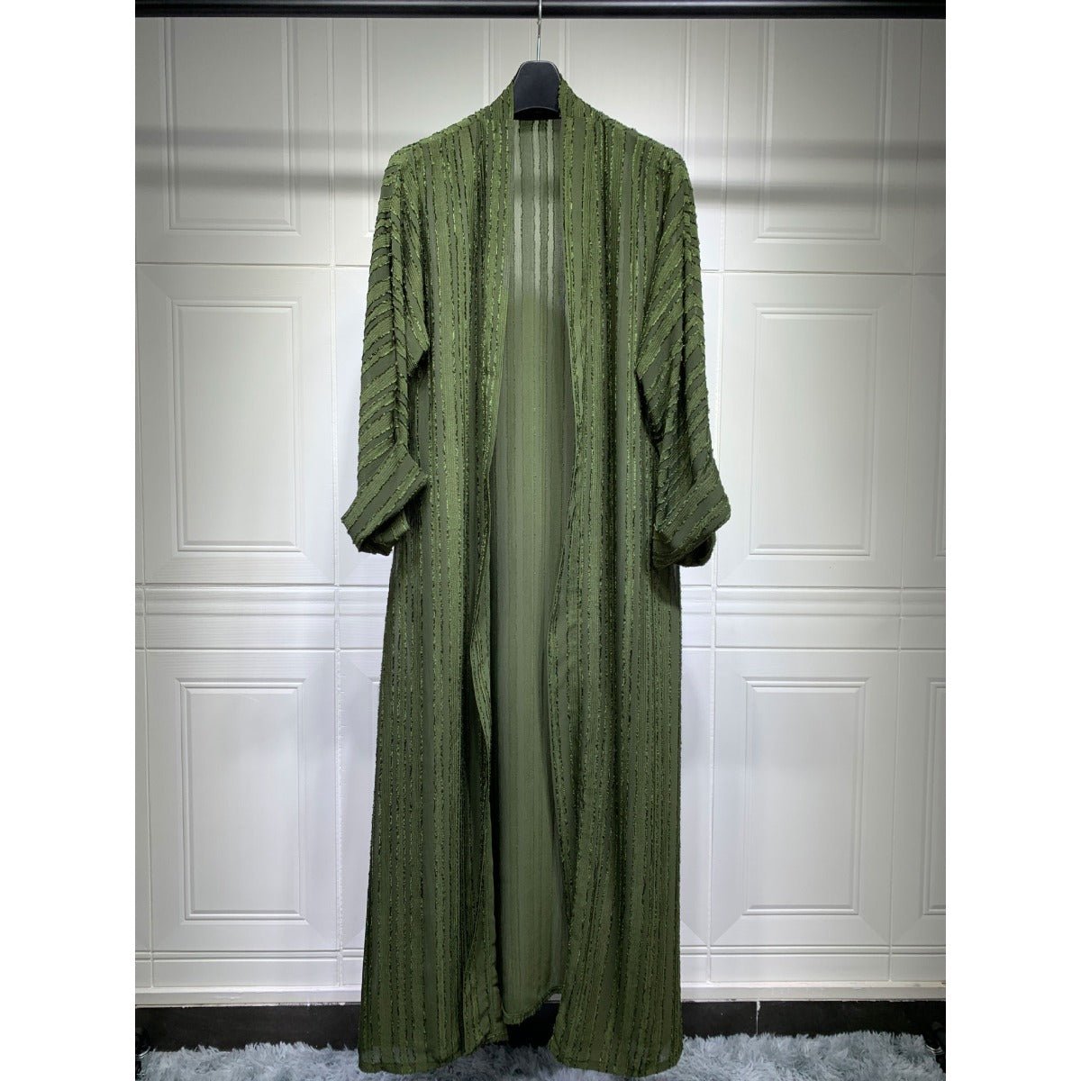 Olive green vintage knitted longline open front cardigan abaya with vertical textured stripes.